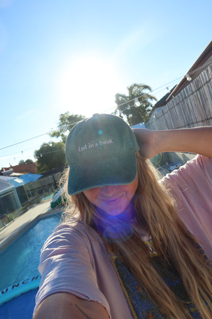 Lost in a book Adult Cap