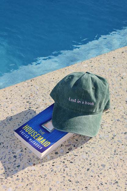 Lost in a book Adult Cap