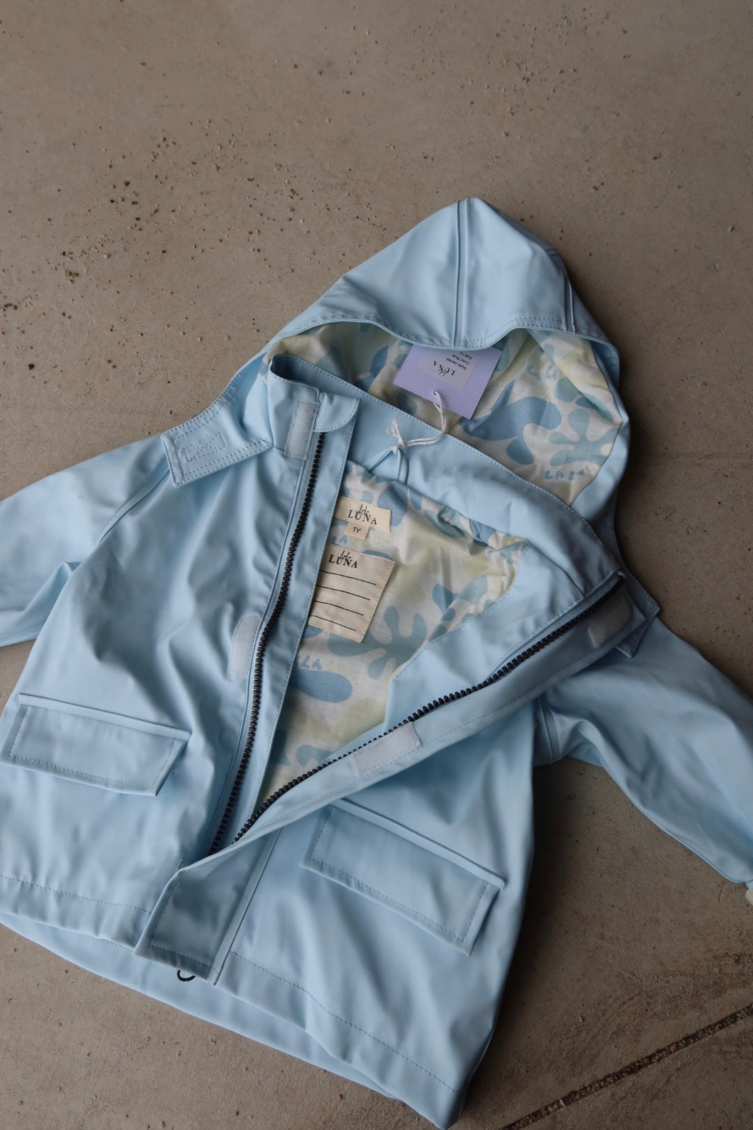 Baby Blue rain jacket Size 1